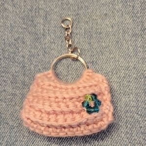 Pink Crochet Mini Bag Keychain with Blue Flower Accent